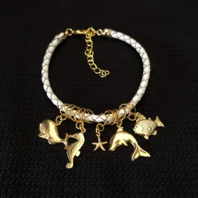 White Leather Bangle Bracelet with Gold Sea Life Charms